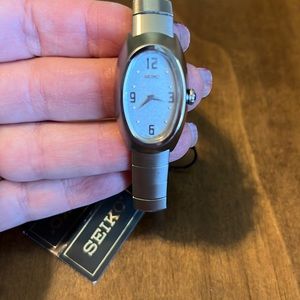 Seiko Women's Stainless Steel Dress Watch w/ Stunning White Oval Dial